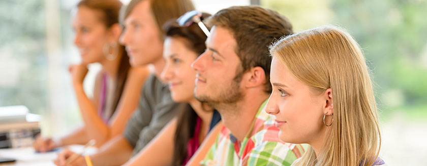 Five Students Listening To Lecture
